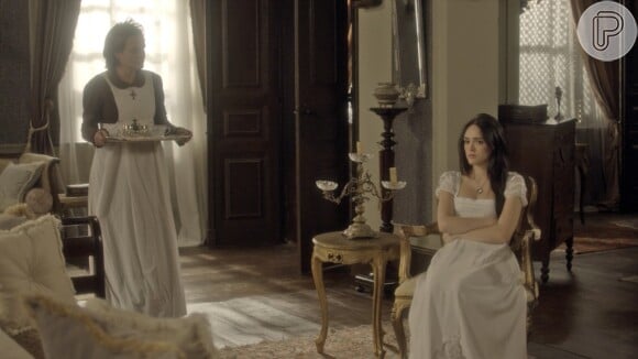 De volta à casa do marido, Anna (Isabelle Drummond) é recebida por Nívea (Viétia Zangrandi), fiel funcionária de Thomas (Gabriel Braga Nunes), na novela 'Novo Mundo'