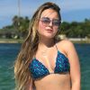 Larissa Manoela arrancou elogios dos fãs após publicar uma foto de biquíni durante passeio de barco em Miami