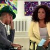 Pharrel Williams se emocionou ao ver um vídeo mostrando o sucesso da música 'Happy' durante entrevista ao programa de Oprah Winfrey