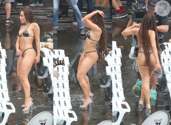 Anitta exibe corpo sequinho e barriga chapada durante gravação de novo clipe