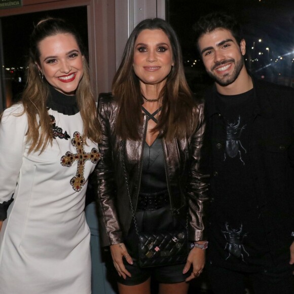 Juliana Paiva e Juliano Laham posam com Flávia Alessandra na área VIP do Rock in Rio