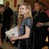 Depois de relaxar no hotel, Avril Lavigne vai a evento em loja do Rio