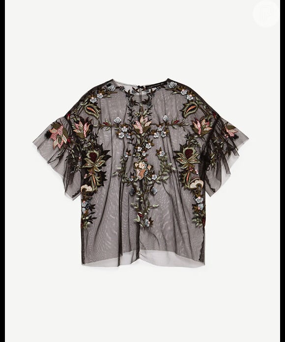 A blusa transparente com detalhes bordados da personagem Luiza é vendida pela Zara a R$ 179