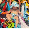 Enrico, de 5 meses, posa com fralda combinando com chapéu: 'Cariocando em cores'