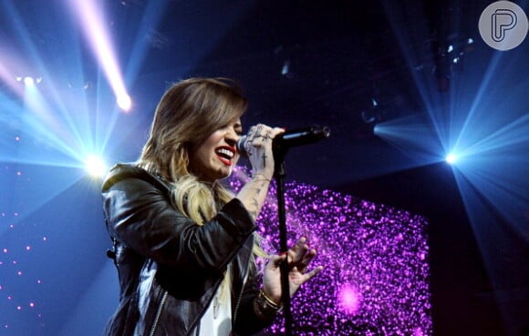 Em maio deste ano, Demi Lovato levou os troféus de Melhor Artista Feminina e Música Favorita de Viagem na Estrada no evento 'Radio Disney Music Awards 2014'