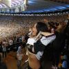 Rihanna torceu para a Alemanha no estádio do Maracanã, no Rio, no jogo contra a Argentina. Para comemorar o único gol da vitória, a cantora levou a blusa e deixou o sutiã à mostra