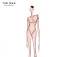 O desginer Tufi Duek, em  parceria com a Faculdade Santa Marcelina, lança um body desenhado por uma aluna, no qual todo lucro das vendas será revertido para a UNACCAM. 