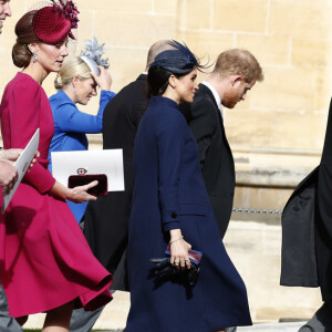 O sobretudo azul-marinho Givenchy disfarçou a barriga de Meghan Markle durante o casamento da princesa Eugenie de York com Jac Brooksbank, no dia 12 de outubro de 2018
Meghan Markle