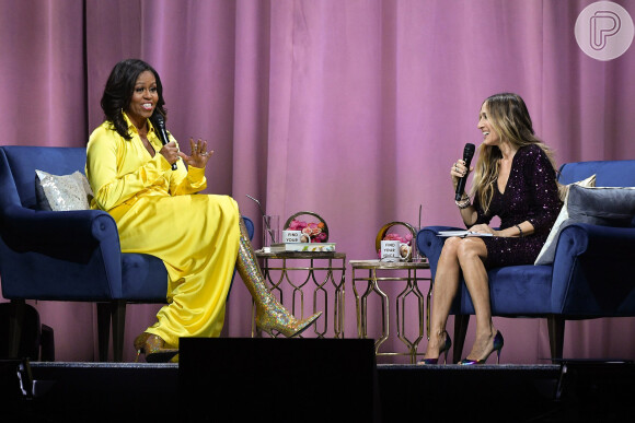 Botas holográficas: Michelle Obama + Sarah Jessica Parker em Nova York