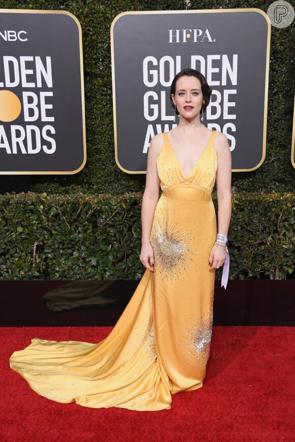 Claire Foy, da série The Crown, escolheu o amarelo para o Globo de Ouro 2019