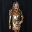 Brilho no look é tendência! A editora de moda Anna Dello Russo com um look bordado em paetês dourados