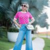 Andressa Suita usa blusa Gucci com cor vibrante e bomba com look na web
