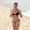 Bruna Linzmeyer foi clicada nesta quinta-feira, 16 de outubro de 2014, na praia do Leblon, na Zona Sul do Rio. Só de biquíni, a atriz mostrou que está em ótima forma