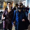 Letícia Sabatella embarca ao lado do marido em aeroporto do Rio