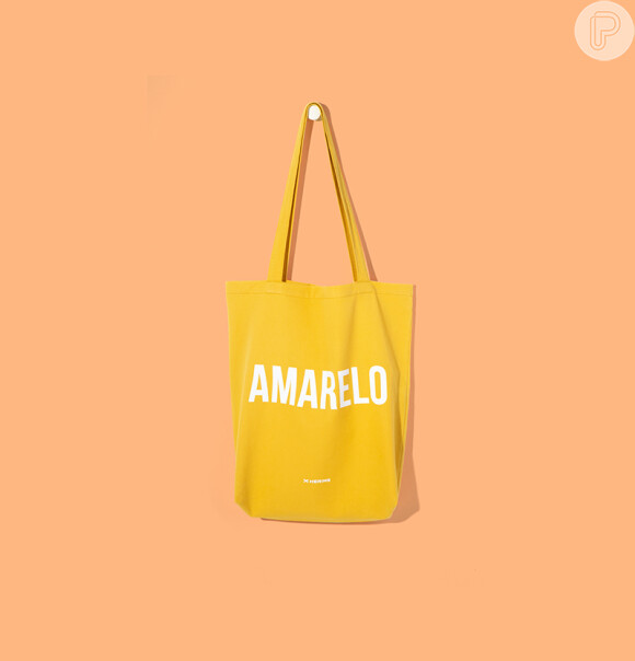 Bolsa amarela da Hering com lettering, para celebrar a prosperidade