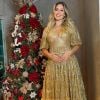 Virgínia Fonseca apostou no vestido dourado com decote e mangas bufantes da marca Amarante Brand