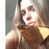 Fernanda Lima busca estatueta conquistada no Prêmio Extra de TV na quarta-feira, 12 de novembro de 2014