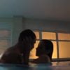 Kátia (Cleo Pires) e André (Cauã Reymond) tiveram cena quente numa piscina na série 'O Caçador'