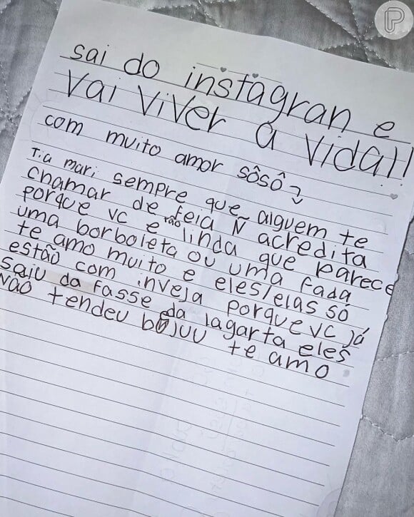Filha de Cauã Reymond e Grazi Massafera escreveu carta para Mariana Goldfarb ao se deparar com críticas à madrasta nas redes sociais