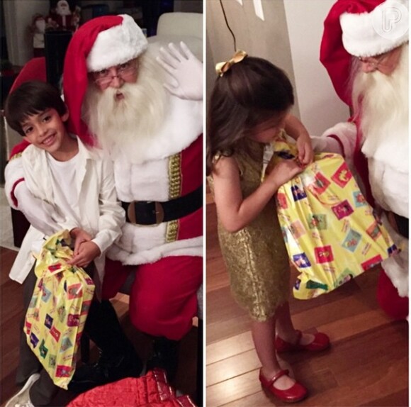 Luca e Isabella ganham presentes do Papai Noel