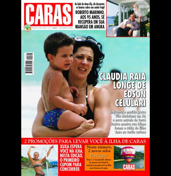 Enzo aparece na capa da revista 'Caras', no colo de Claudia Raia, em 2000