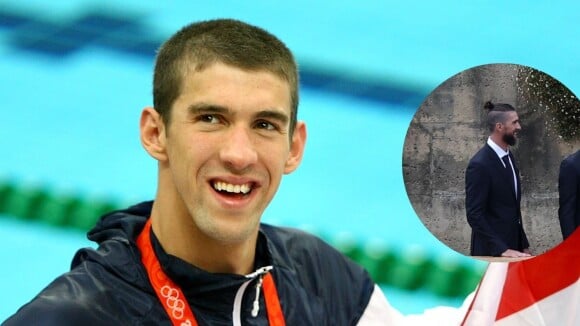 'Irreconhecível': Michael Phelps surge de coque samurai e barba na cerimônia de abertura das Olimpíadas de Paris e impressiona internautas