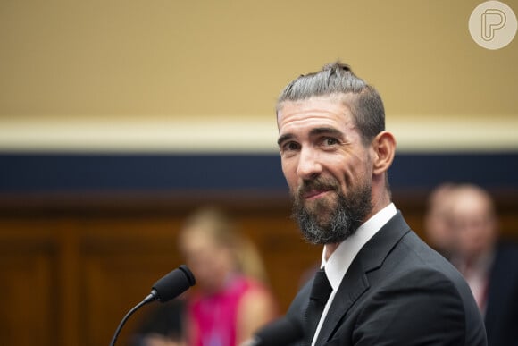 Novo visual de Michael Phelps deixou o nadador irreconhecível e rendeu muitos comentários