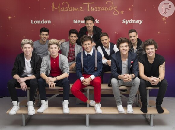 Integrantes do One Direction posam ao lado de suas estátuas de cera, inauguradas no Madame Tussauds, em Londres, nesta quinta-feira, 18 de abril de 2013