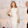 A atriz Rene Russo, de 61 anos, mostrou elegância com um vestido em tule branco J. Mendel