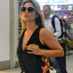 Flávia Alessandra embarca em aeroporto do Rio usando bolsa Givenchy de R$ 3.000