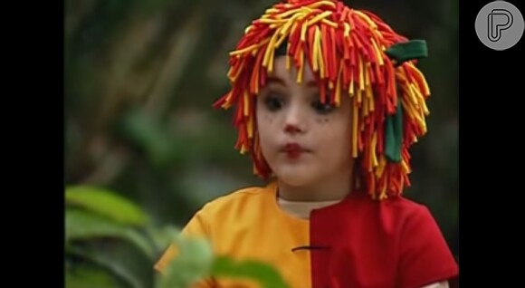 Isabelle começou a carreira aos 7 anos interpretando a boneca Emília, no "Sítio do Picapau Amarelo" (2001)
