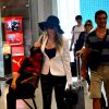 Separada de Amaury Nunes, Danielle Winits evita ser fotografada em aeroporto