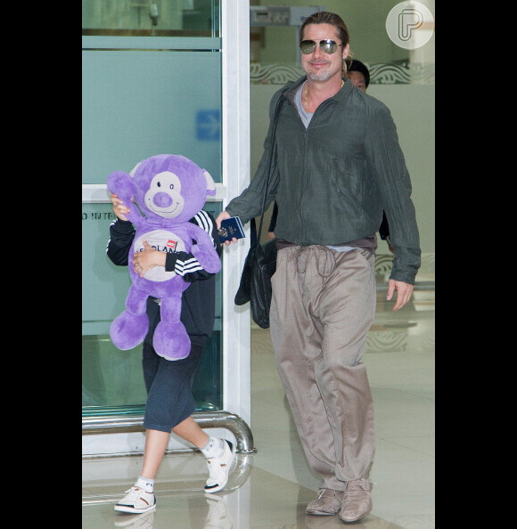 Brad Pitt chega à Coreia do Sul com o filho, Pax, de 9 anos, em 11 de junho de 2013 para divulgar o filme 'Guerra Mundial Z'