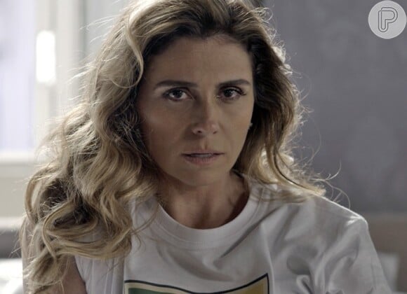 Atena (Giovanna Antonelli) fica chocada ao saber que Romero (Alexandre Nero) conheceu o Pai, na novela 'A Regra do Jogo'