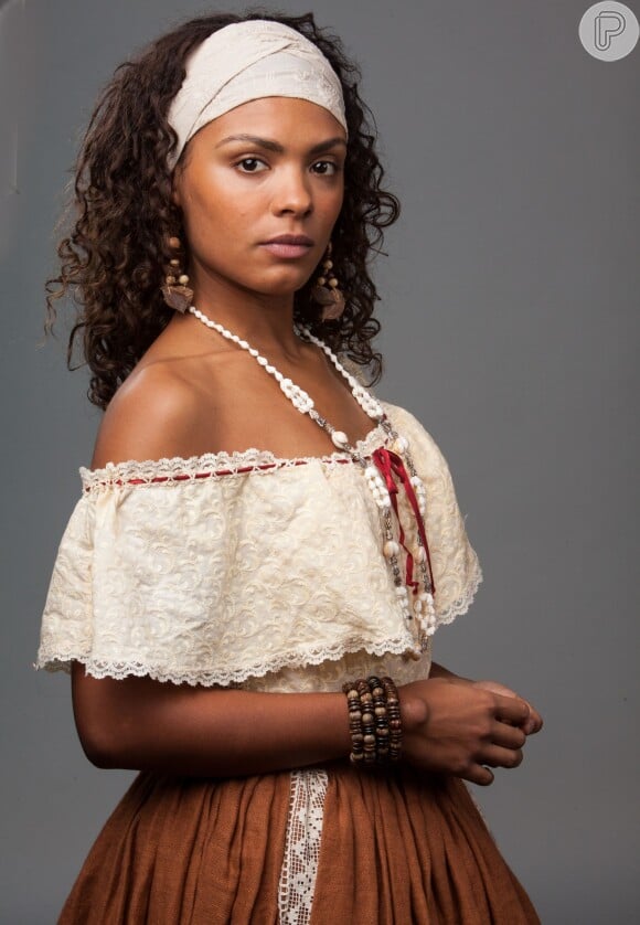 Esméria (Lidi Lisboa) é a mucama de Maria Isabel (Thais Fersoza) e sua principal aliada nas maldades contra Juliana (Gabriela Moreyra), na novela 'Escrava Mãe'