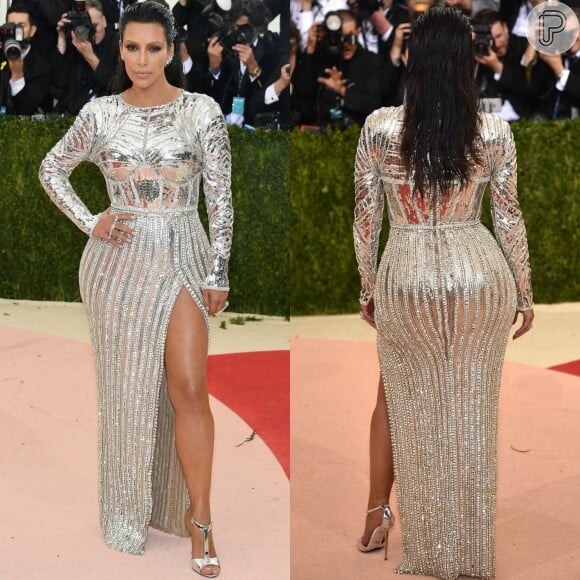 Kim Kardashian usou peça toda metalizada com fenda profunda da grife Balmain no Met Gala 2016