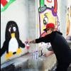 Justin Bieber grafita um pinguim