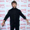 Kayky Brito também optou pelo preto ao chegar ao Fashion Rio, em 7 de novembro de 2013. O ator desfilou pela Coca-Cola ao lado de Bruna Marquezine e Isabelle Drummond