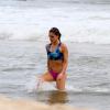 Fernanda Lima usou um biquíni discreto na tarde de domingo na praia