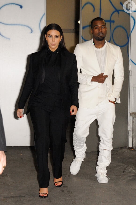 Kim Kardashian investiu no estilo boyish para conferir a Semana de moda de Paris em 2013 quando ainda estava grávida de North West