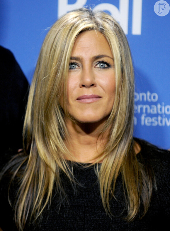Jennifer Aniston tem 45 anos e não tem filhos (27 de agosto de 2014)