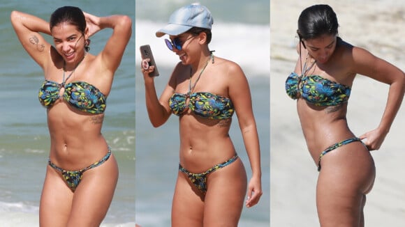 Anitta mergulha, 'flagra' paparazzo e dança com Jojô Toddynho em praia. Fotos!