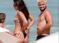 Bruno Gissoni beija Yanna Lavigne e enche a filha de carinho na praia. Fotos!