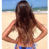 Recentemente, Carla Perez postou no Instagram uma foto da filha de biquíni na praia, arrancando muitos elogios dos fãs