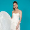 Marina Ruy Barbosa, para cantar com Roberto Carlos, usou um vestido branco da estilista romena Maria Lucia Hohan