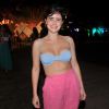Fernanda Vasconcellos usou um top que faz referência a uma lingerie para terceiro dia do Réveillon de Pipa, no município de Tibau do Sul, no Rio Grande do Norte
