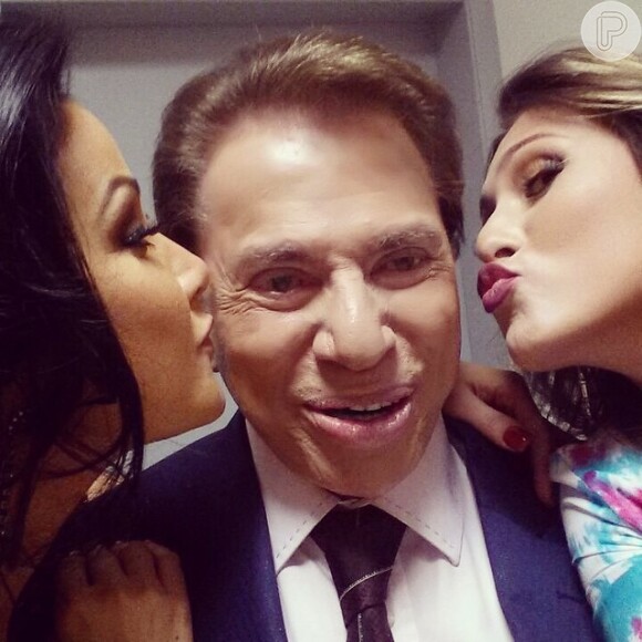 Silvio Santos ganhou beijinho de Helen Ganzarolli e Livia Andrade na tarde desta terça-feira, 18 de novembro de 2014