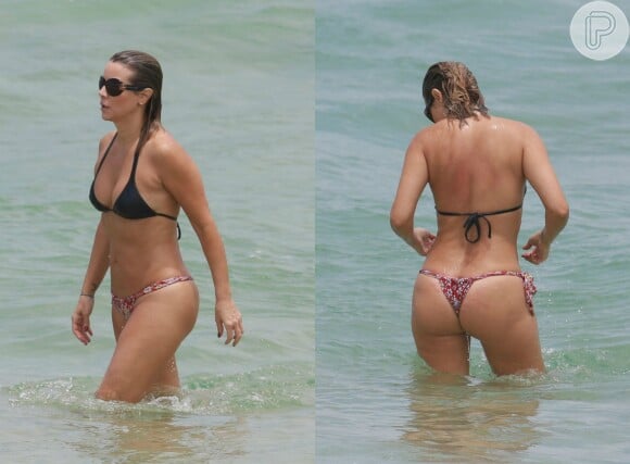 A atriz Christine Fernandes curtiu muito a praia neste verão e exibiu o corpão aos 46 anos