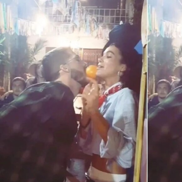 João Guilherme e Bruna Marquezine também fizeram uma brincadeira de segurar uma laranja com suas bocas