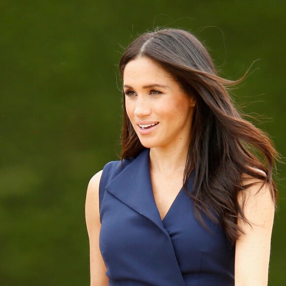 'Tudo o que Meghan está fazendo ao sair sem aliança está alimentando os rumores de que ela e Harry estão tendo problemas conjugais', diz fonte do tabloide